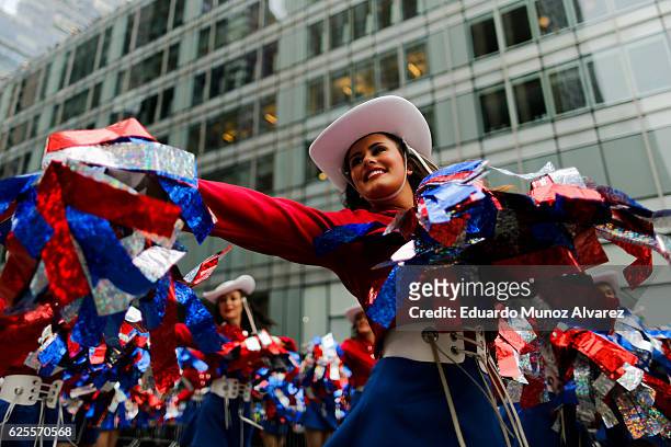Revellers take part during the 90th Macy's Annual Thanksgiving Day Parade on November 24, 2016 in New York City. Security was tight in New York City...
