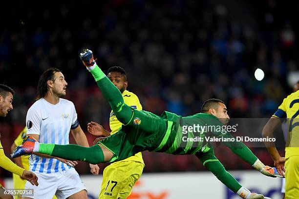 Sergio Asenjo and Cedric Bakambu of Villareal compete for the ball with Alain Nef of FC Zurich during the UEFA Europa League match between FC Zurich...