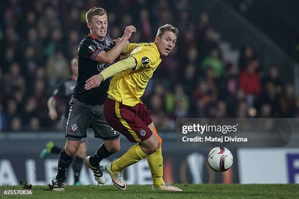 Lukas Julis of Sparta Prague competes for the ball with James Ward-Prowse of Southampton during the UEFA Europa League match between AC Sparta Praha...