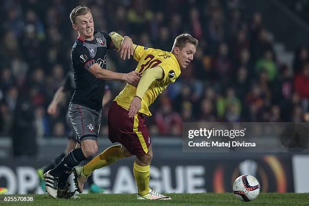 Lukas Julis of Sparta Prague competes for the ball with James Ward-Prowse of Southampton during the UEFA Europa League match between AC Sparta Praha...