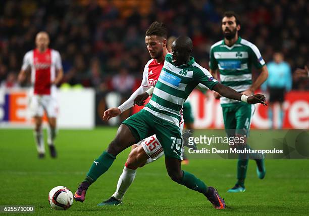 Ousmane Coulibaly of Panathinaikos battles with Mitchell Dijks of Ajax during the UEFA Europa League Group G match between AFC Ajax and Panathinaikos...