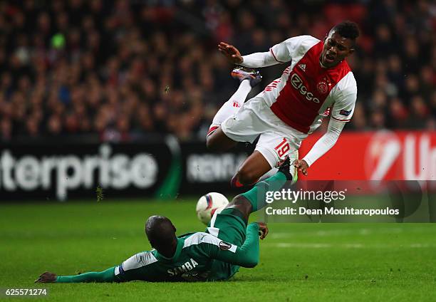 Mateo Cassierra of Ajax is challenged by Christopher Samba of Panathinaikos during the UEFA Europa League Group G match between AFC Ajax and...