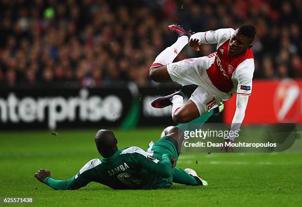 Mateo Cassierra of Ajax is challenged by Christopher Samba of Panathinaikos during the UEFA Europa League Group G match between AFC Ajax and...