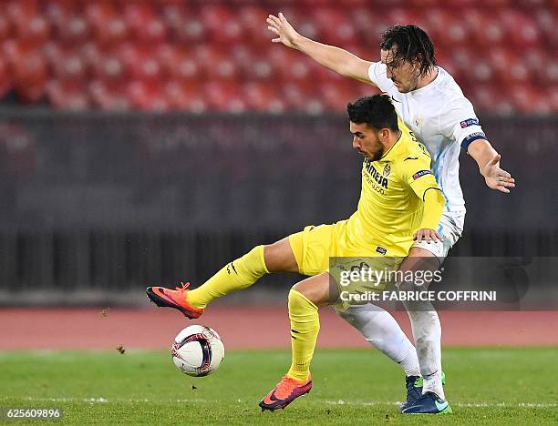 Villarreal's Italian forward Nicola Sansone vies for the ball with Zurich's Swiss defender Alain Nef during the UEFA Europa League group L football...