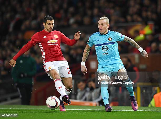 Henrikh Mkhitaryan of Manchester United and Rick Karsdorp of Feyenoord battle for the ball during the UEFA Europa League Group A match between...