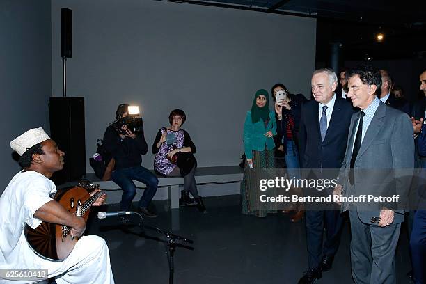 Minister of Foreign Affairs and International Development, Jean-Marc Ayrault and President of the 'Institut du Monde Arabe' Jack Lang attend the...