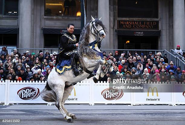 People attend the 83rd Annual Thanksgiving Day Parade at State Street in Chicago, Illinois on November 24, 2016. The parade featured marching bands...