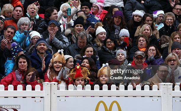 People attend the 83rd Annual Thanksgiving Day Parade at State Street in Chicago, Illinois on November 24, 2016. The parade featured marching bands...