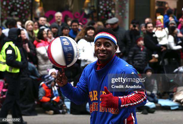 People attend the 83rd Annual Thanksgiving Day Parade at State Street in Chicago, Illinois on November 24, 2016. The parade featured marching bands...