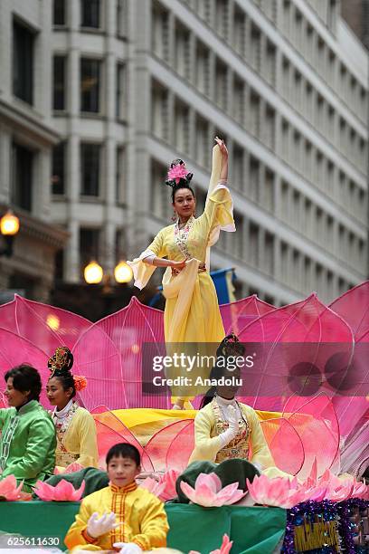 People attend the 83rd Annual Thanksgiving Day Parade at State Street in Chicago, Illinois on November 24, 2016. The parade featured marching bands...