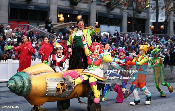 People attend the 83rd Annual Thanksgiving Day Parade at State Street in Chicago, Illinois on November 24, 2016. The parade featured marching bands...