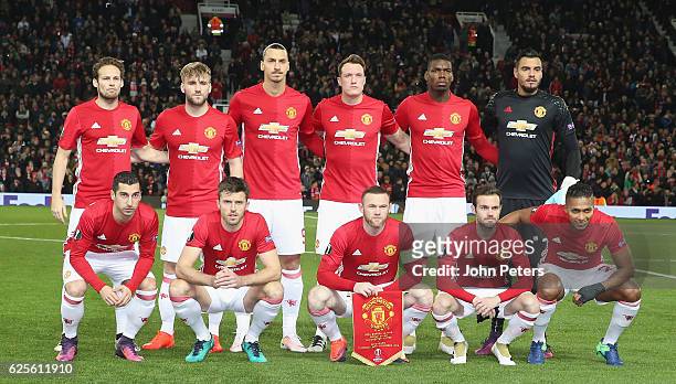 The Manchester United team lines up ahead of the UEFA Europa League match between Manchester United FC and Feyenoord at Old Trafford on November 24,...
