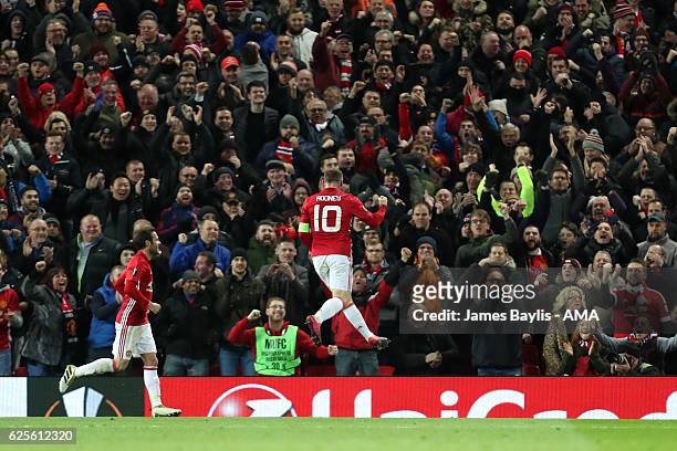 Wayne Rooney of Manchester United celebrates scoring the first goal to make the score 1-0 during the UEFA Europa League match between Manchester...