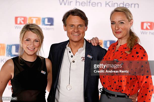 Iris Mareike Steen, Wolfgang Bahro and Eva Mona Rodekirchen are seen in the studio of the RTL Telethon TV show on November 24, 2016 in Cologne,...