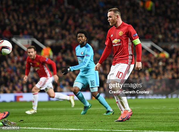Wayne Rooney of Manchester United scores their first goal during the UEFA Europa League Group A match between Manchester United FC and Feyenoord at...