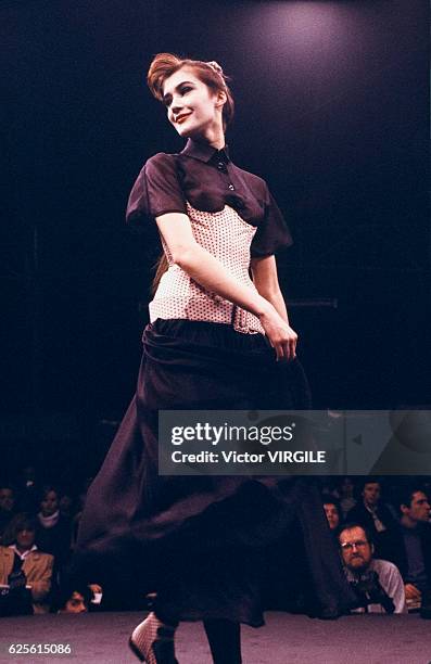 Model walks the runway at the Chantal Thomass Ready to Wear Fall/Winter 1985-1986 fashion show during the Paris Fashion Week in March, 1985 in Paris,...