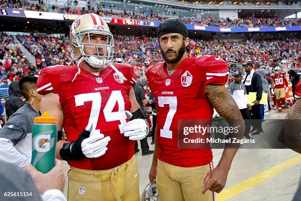 Joe Staley and Colin Kaepernick of the San Francisco 49ers stand on the sideline during the game against the New England Patriots at Levi Stadium on...