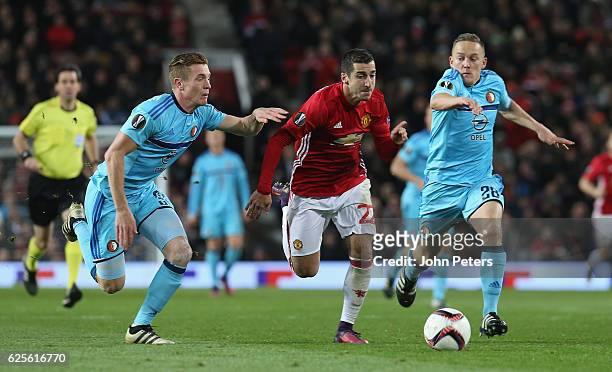 Henrikh Mkhitaryan of Manchester United in action with Wessel Dammers and Jens Toornstra of Feyenoord during the UEFA Europa League match between...