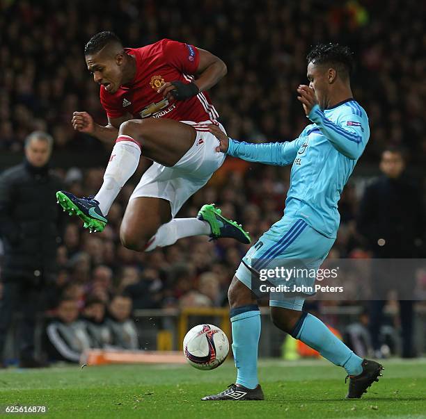 Antonio Valencia of Manchester United in action with Renato Tapia of Feyenoord during the UEFA Europa League match between Manchester United FC and...