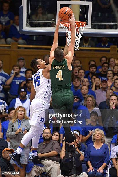 Omar Prewitt of the William & Mary Tribe dunks against Frank Jackson of the Duke Blue Devils at Cameron Indoor Stadium on November 23, 2016 in...