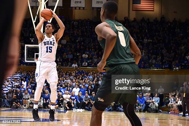 Frank Jackson of the Duke Blue Devils puts up a shot against the William & Mary Tribe at Cameron Indoor Stadium on November 23, 2016 in Durham, North...