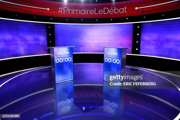 General view of the TV set of the first televised debate between the two remaining candidates for the right-wing party primaries is seen in Paris on...