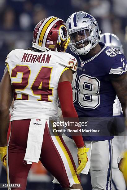 Dez Bryant of the Dallas Cowboys argues with Josh Norman of the Washington Redskins after catching a pass in their game at AT&T Stadium on November...