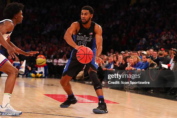 Duke Blue Devils guard Matt Jones during the second half of the Champions Classic NCAA basketball game between the Kansas Jayhawks and the Duke Blue...