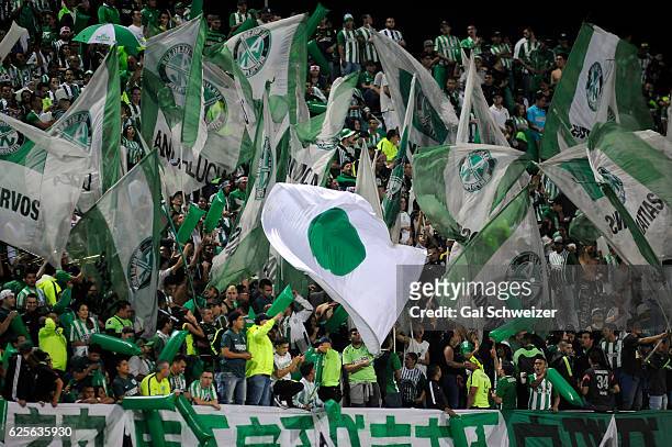 Fans of Colombia's Atletico Nacional cheer for their team prior to a second leg match between Atletico Nacional and Cerro Porteño as part of Semi...