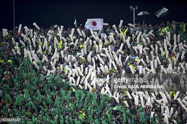 Supporters of Colombia's Atletico Nacional cheer for their team before the start of their Copa Sudamericana semifinal football match against...