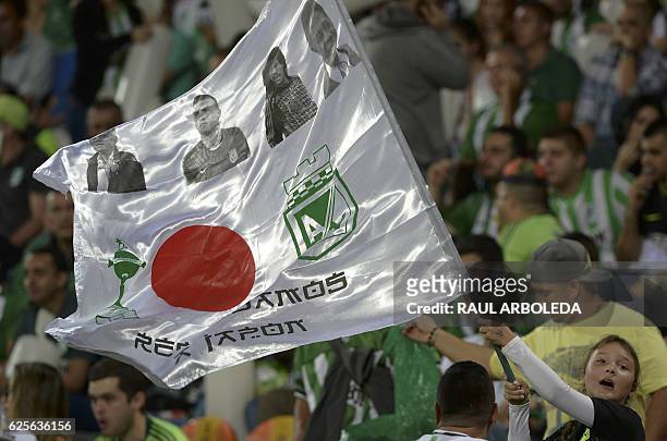 Supporters of Colombia's Atletico Nacional cheer for their team before the start of their Copa Sudamericana semifinal football match against...