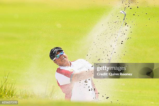 Kiradech Aphibarnrat of Thailand plays out of the bunker during day two of the World Cup of Golf at Kingston Heath Golf Club on November 25, 2016 in...