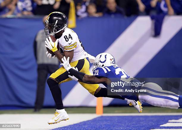 Antonio Brown of the Pittsburgh Steelers beats Vontae Davis of the Indianapolis Colts to make a touchdown catch during the second quarter of the game...