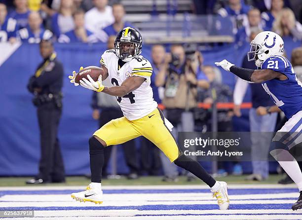 Antonio Brown of the Pittsburgh Steelers beats Vontae Davis of the Indianapolis Colts to make a touchdown catch during the second quarter of the game...