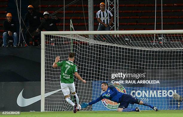 Paraguay's Cerro Porteno goalkeeper Antony Silva stops the ball shot by Colombia's Atletico Nacional's Ezequiel Rescaldani during their Copa...