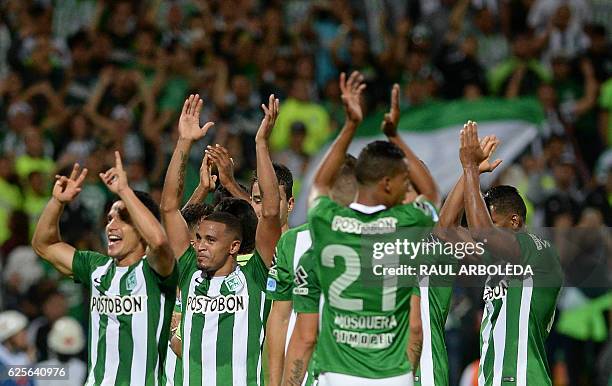 Colombia's Atletico Nacional players celebrate at the end of their match againts Paraguay's Cerro Porteno for the Copa Sudamericana at the Atanasio...