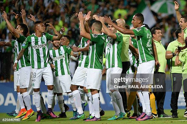 Colombia's Atletico Nacional players celebrate at the end of their match againts Paraguay's Cerro Porteno for the Copa Sudamericana at the Atanasio...