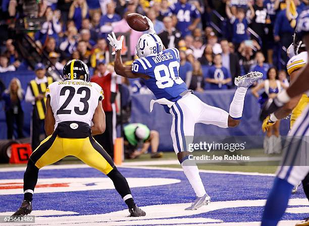 Chester Rogers of the Indianapolis Colts attempts to make a catch while being guarded by Mike Mitchell of the Pittsburgh Steelers during the second...