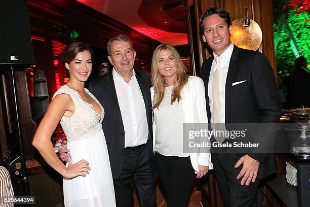 Claudia Schwarz, Wolfgang Niersbach and his girlfriend Marion Popp, Axel Ludwig, Director of the hotel Vier Jahreszeiten during the christmas party...