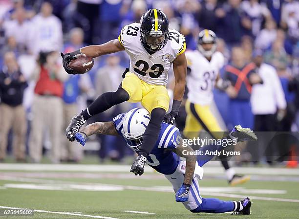 Mike Mitchell of the Pittsburgh Steelers hurdles Donte Moncrief of the Indianapolis Colts as he returns an interception during the fourth quarter of...