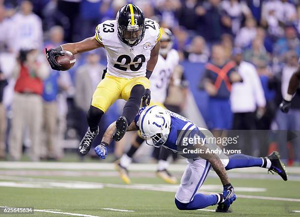 Mike Mitchell of the Pittsburgh Steelers hurdles Donte Moncrief of the Indianapolis Colts as he returns an interception during the fourth quarter of...