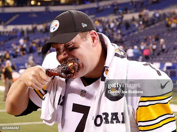 Ben Roethlisberger of the Pittsburgh Steelers eats a turkey leg after the Steelers beat the Indianapolis Colts 28-7 at Lucas Oil Stadium on November...