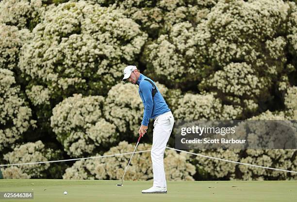 Chris Wood of England putts during day two of the World Cup of Golf at Kingston Heath Golf Club on November 25, 2016 in Melbourne, Australia.