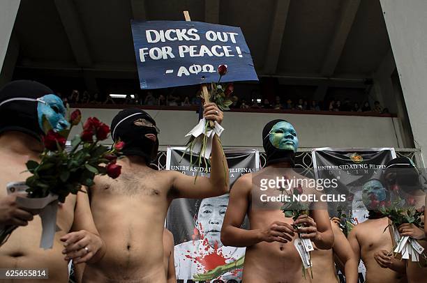 Nude members of a university fraternity participate in a "Oblation Run" to protest against the burial of the late dictator Ferdinand Marcos at the...