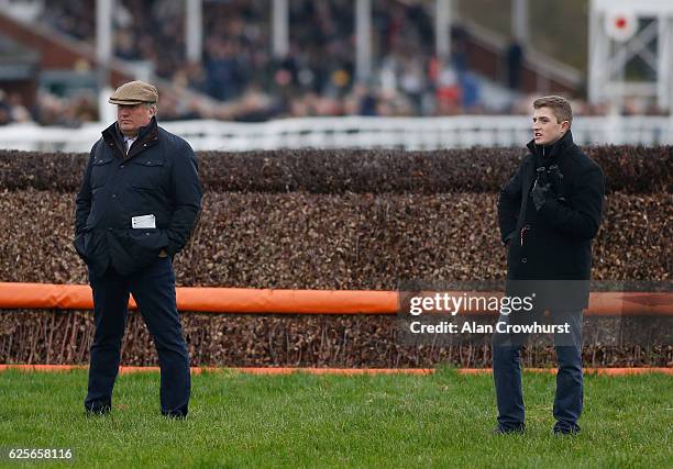 Trainer Paul Nicholls with his assistant Harry Derham at Taunton Racecourse on November 24, 2016 in Taunton, England.
