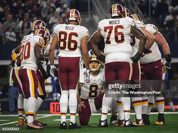 Washington Redskins quarterback Kirk Cousins in the huddle during the game between the Dallas Cowboys and the Washington Redskins on Thursday,...