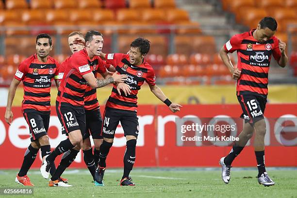 Jumpei Kusukami of the Wanderers celebrates with his team mates after scoring a goal during the round eight A-League match between the Western Sydney...