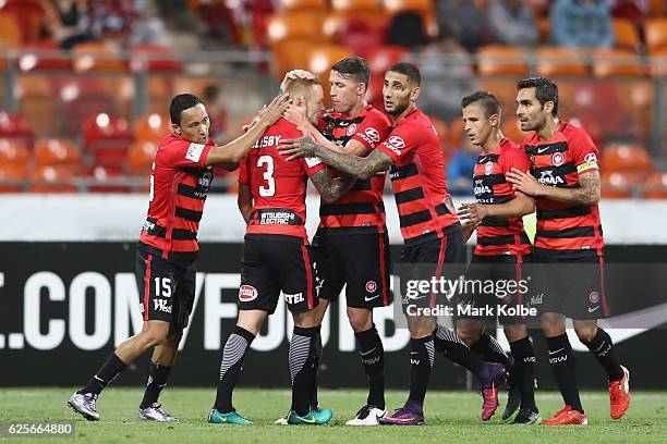 Jack Clisby of the Wanderers celebrates with his team mates after setting up a goal for Jumpei Kusukami of the Wanderers during the round eight...