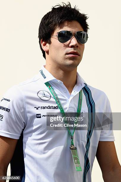 Lance Stroll of Canada and Williams walks in the Paddock before practice for the Abu Dhabi Formula One Grand Prix at Yas Marina Circuit on November...
