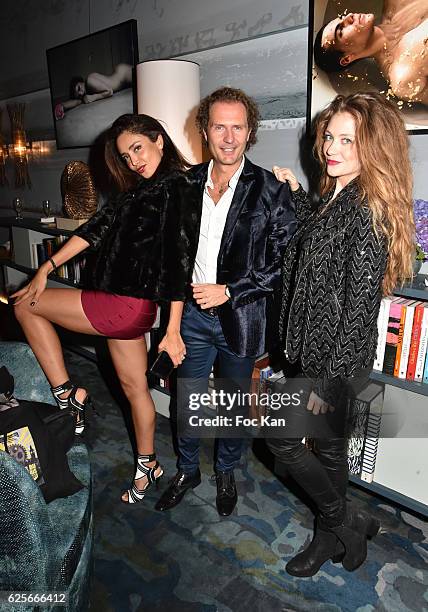 Model Patricia Contreras, PR Nicolas Mereau and TV presenter Cyrielle Joelle attend 'Vibrations' Stefanie Renoma Photo Exhibition at Hotel Nolinski...